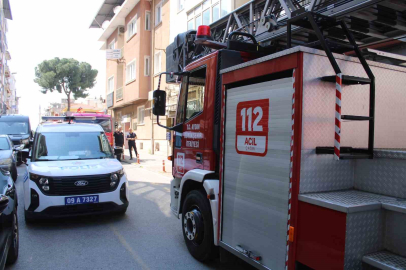 Çatıda yaktığı kablo ekipleri harekete geçirdi