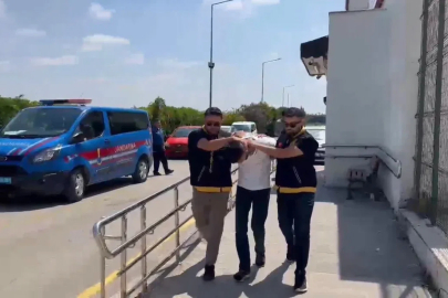 Kadın kılığına girip iş yerine kurşun yağdıran şüpheli tutuklandı
