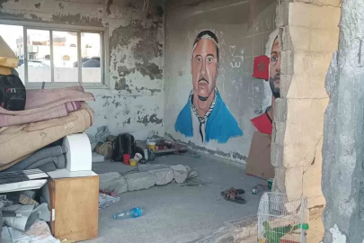 Gazze’de bir sanatçı daha, Filistin’i destekleyen ABD’li rapçi Macklemore’un duvar resmini yaptı
