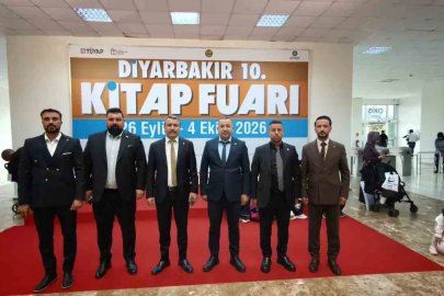 MHP Diyarbakır İl Başkanı Özcoşkun ve yönetimi, Kitap Fuarını gezdi
