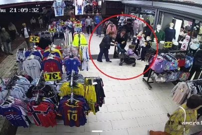 Mağazadan eşofman çalan turistler, taktıkları otelin bilekliği sayesinde yakalandı
