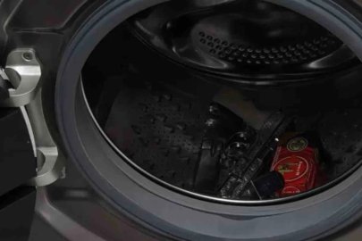 Evin her köşesinden senet, çamaşır makinesinden ise silah çıktı
