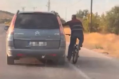 Bisiklet sürücüsünün tehlikeli yolculuğu
