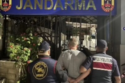 Cinayet zanlısı gizli bölmede yakalandı
